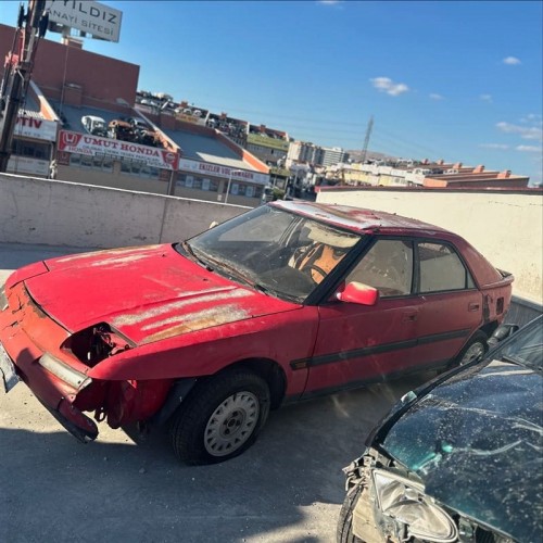 Mazda 323 1993 sol ön kapı kırmızı