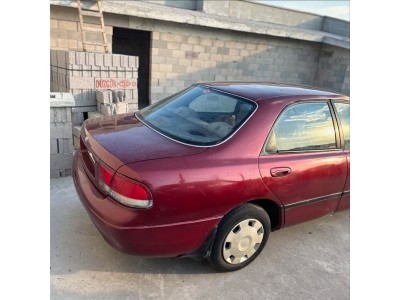 Mazda 626 1996 sağ arka çamurluk kırmızı