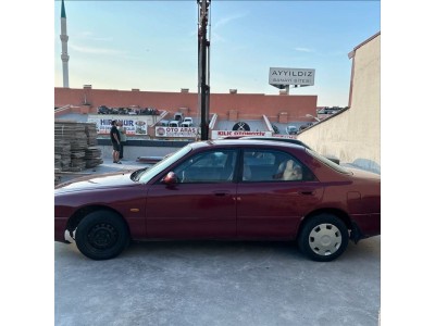 Mazda 626 1996 sol ön kapı kırmızı