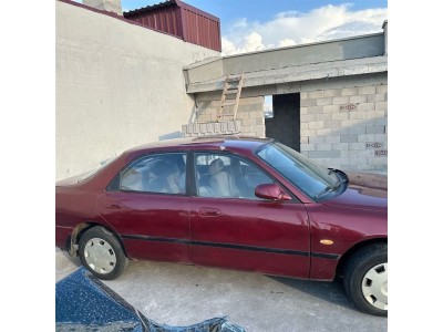 Mazda 626 1996 sağ arka kapı kırmızı