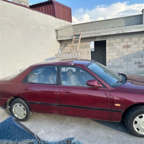 Mazda 626 1996 sağ arka kapı kırmızı