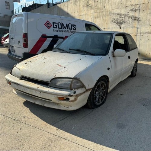 Suzuki Swift 1992 sol ön kapı beyaz