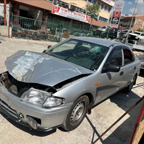 Mazda 323 1.5 1998 sol ön çamurluk