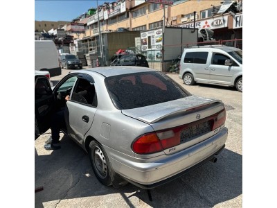 Mazda 323 1.5 1998 sol arka stop camı